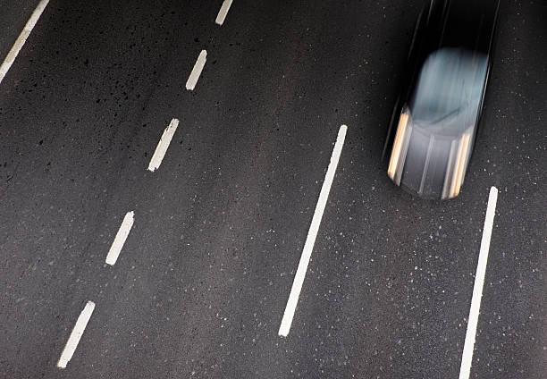istock Car Speeding, Country Road Through Summer 515072154