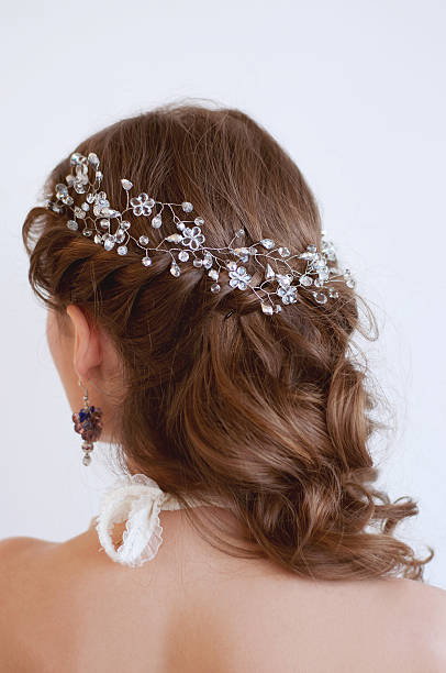 istock Bridal hairstyle with beaded crystal headpiece 515072402