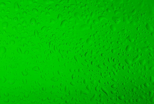 istock Texture water drops on the green bottle as a background. 515073598