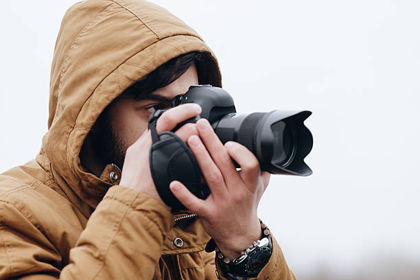 istock Photographer take picture in open space at river 515073884