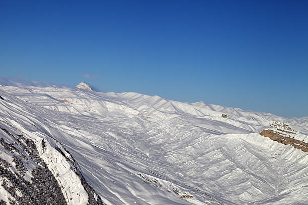 Winter snowy mountains at nice sun day