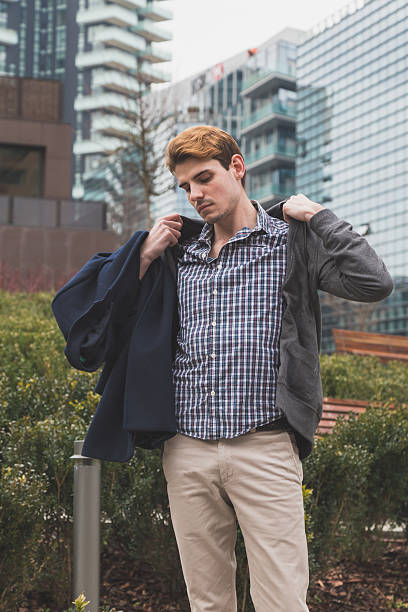 istock Young man posing in the city streets 515076608