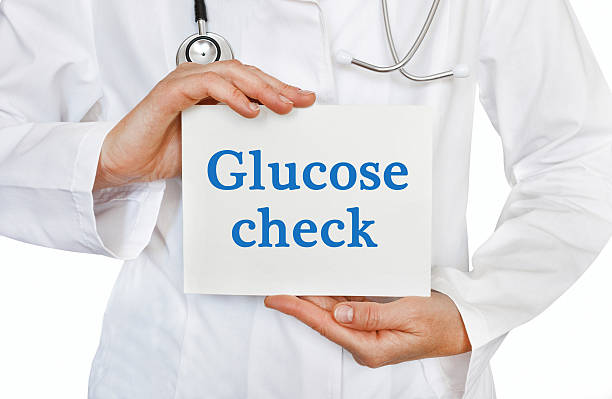 istock Doctor holding a card with Glucose Check, Medical concept 515077978