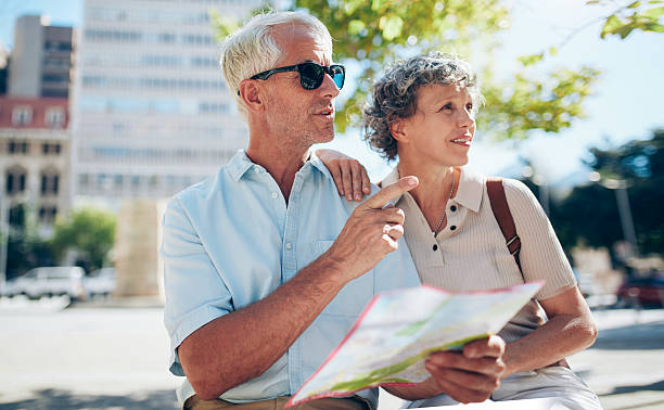 istock Tourist using city map for directions 515079102