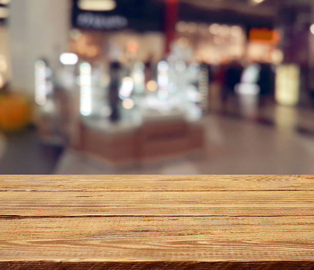 istock wooden background and defocused store bokeh background 515080520