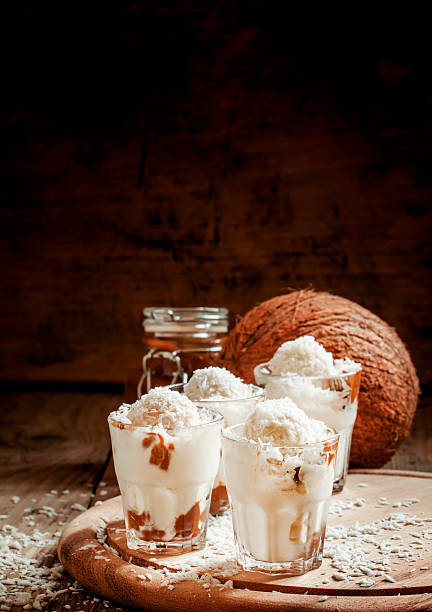 istock Vanilla ice cream with coconut and caramel sauce 515082562