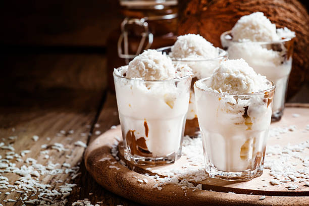 istock Vanilla ice cream with coconut and caramel sauce 515083120