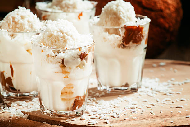 istock Vanilla ice cream with coconut and caramel sauce 515083224