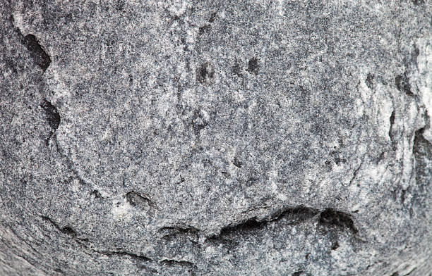 istock The surface of natural stone as a natural background. Selective 515083286