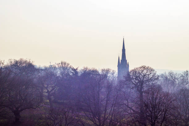 istock Church top above foggy dark forest 515086594