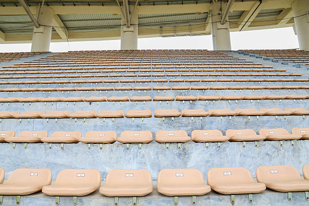 istock yellow seat in the  stadium 515140881