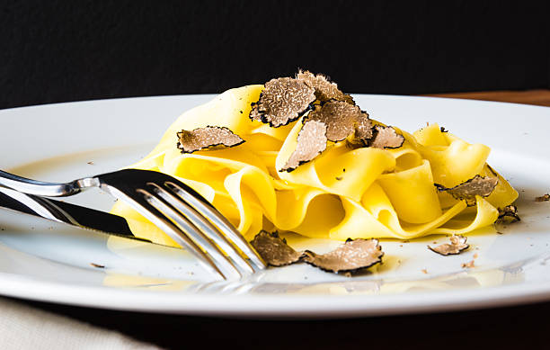 Plate of pasta. Pasta tagliatelli with truffles.Restaurant menu plate. tartuffo stock pictures, royalty-free photos & images