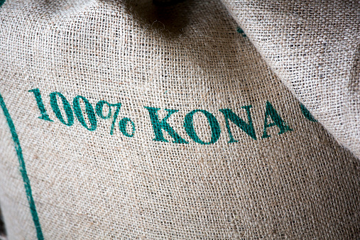 The big island, Kona Coffee and a coffee farm.  Burlap bag of Kona.