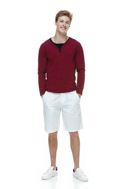 istock Smiling casual man standing with hands in pockets 515144135