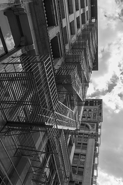istock fire escape stairs in ny in black and white 515144217