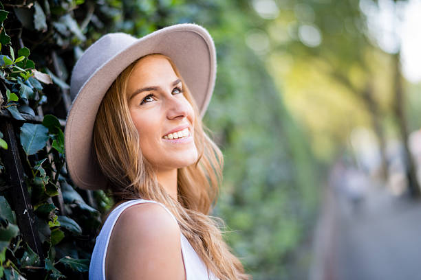 Beautiful woman portrait daydreaming and looking happy