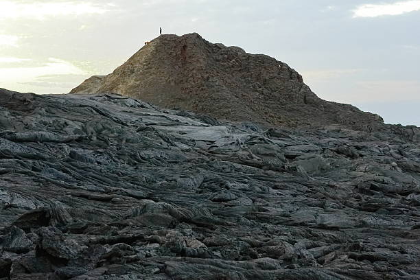Solid lava field-caldera of world longest existing burning lava lake dating from 1906-Erta Ale basaltic shield volcano at 613 ms.high-0.7 x 1.6 km.eliptic crater. Danakil desert-Afar region-Ethiopia.