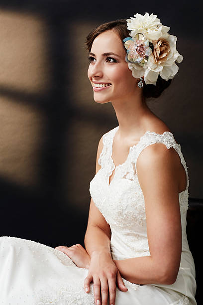 istock Glamorous young bride in wedding dress, smiling 515147129