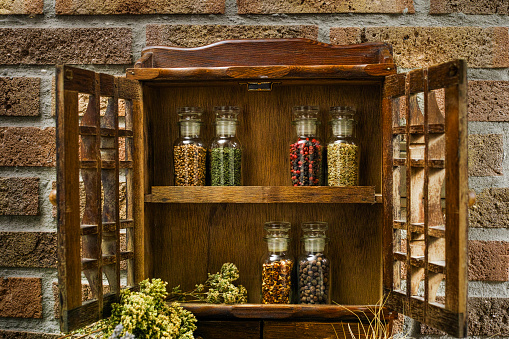Farms vintage Spice Rack or Storage Cabinet: Wall Mount - Display Shelf, Six Glass Bottleson rural background village life