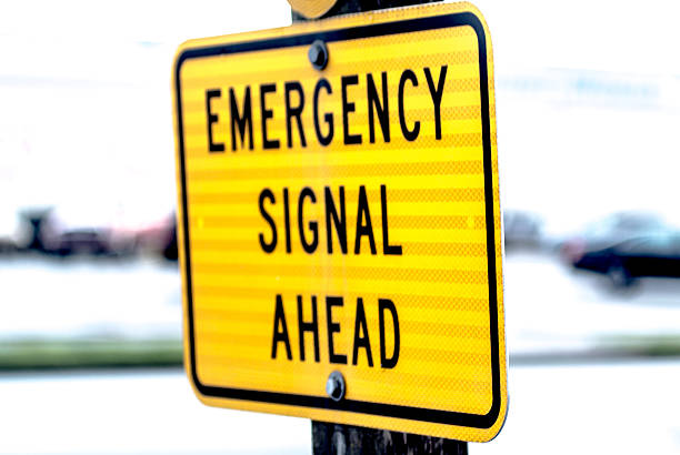 istock Emergency signal ahead sign attached to pole 515149570