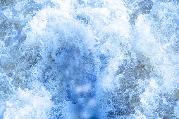 Watersplashes and sea foam deep blue and white color- as Background