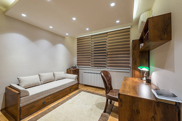 istock Wooden desk and modrn sofa 515152742