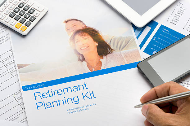 istock Retirement planning brochure with mature couple 515153542