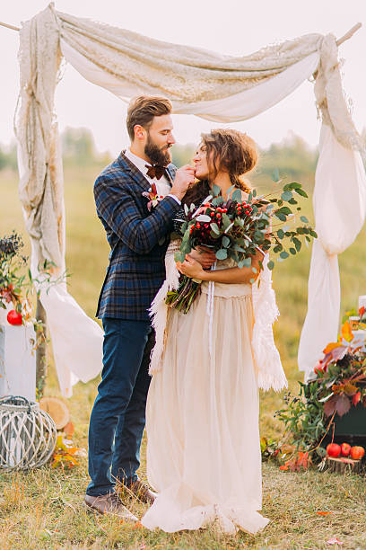 istock Happy couple softly hold each other on the wedding ceremony 515154780