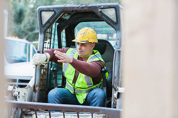 Man Using Backhoe 340+ Man Operating Excavator Stock Photos, Pictures & Royalty-Free ...