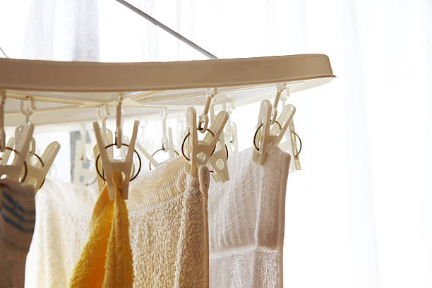 Closeup of pastel color laundry drying with copy space