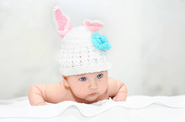istock Cute baby in a rabbit costume 515159404
