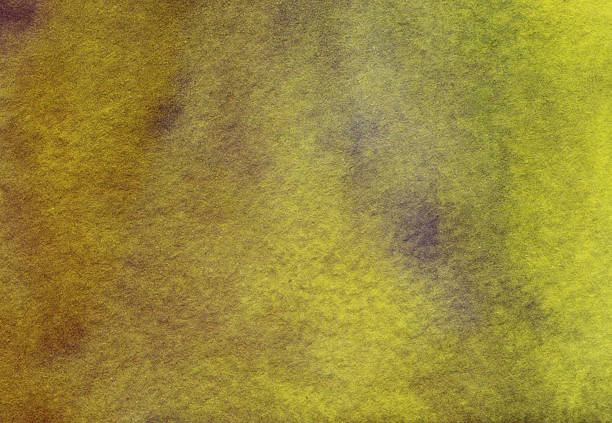 istock Hand painted ochre yellow and brown background on paper 515161582
