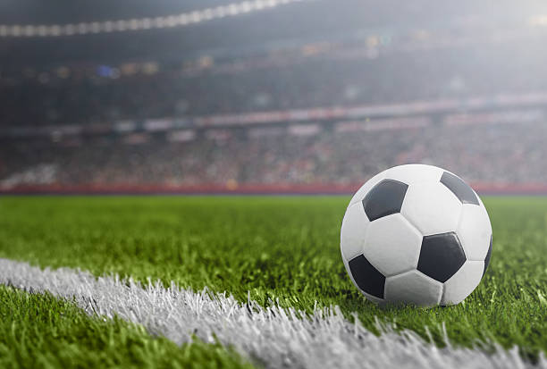 istock Soccer Ball on Stadium Field 515161588
