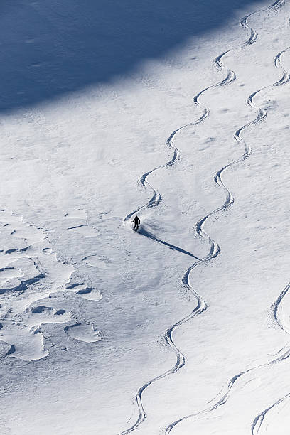 istock A skier skiing in powder 515166831