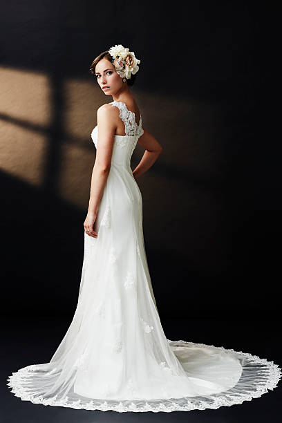 istock Elegant young bride in wedding dress, studio shot 515168273