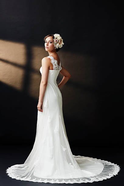 istock Elegant young bride in wedding dress, studio shot 515168275