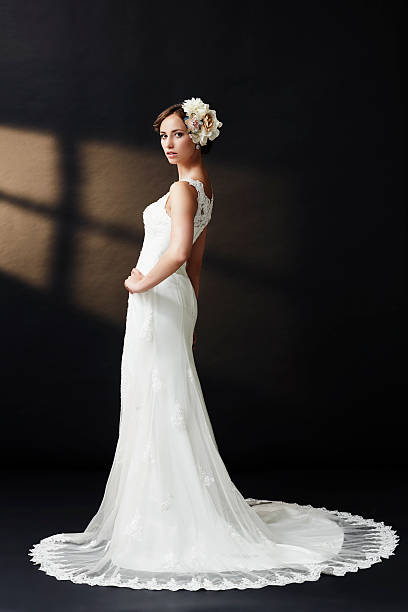 istock Elegant young bride in wedding dress, studio shot 515168281
