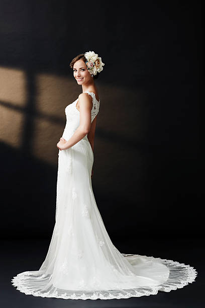 istock Glamorous young bride in wedding dress, smiling 515168285