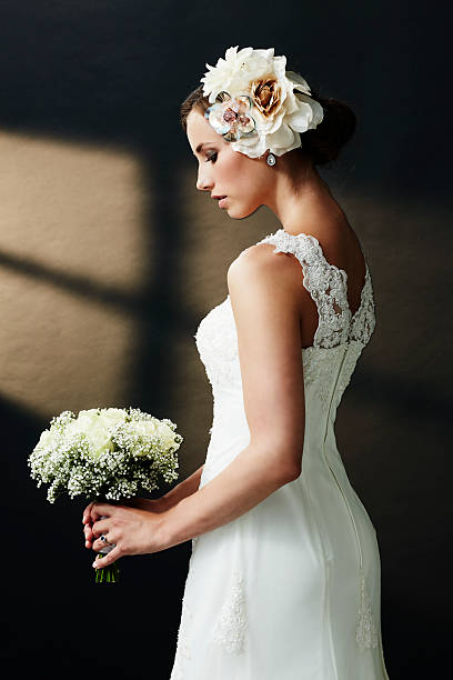 istock Stunning young bride holding bouquet 515168297