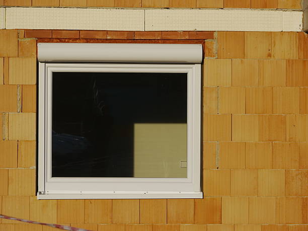 istock building site house window brick wall glass 515169965