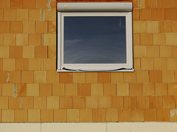 istock building site house window brick wall glass 515169973