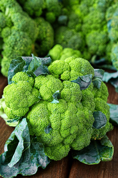 istock Fresh raw broccoli on wooden board 515171251