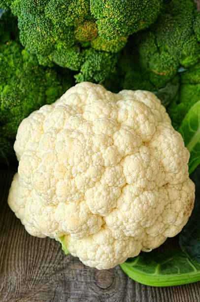 istock Cauliflower on the wooden background 515171255