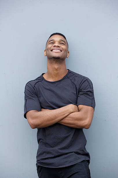 istock Cool guy smiling with arms crossed 515173469
