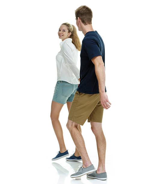 istock Smiling couple holding hand & walking 515174711