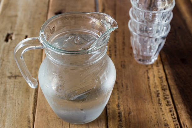 istock Glass pitcher of water and glass. 515186880
