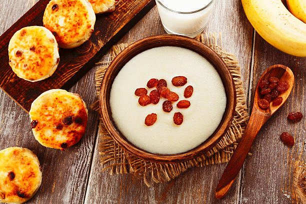 Semolina porridge and cheese pancakes stock photo