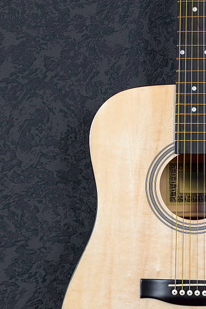 akustische gitarre mit hintergrund - wild west audio stock-fotos und bilder