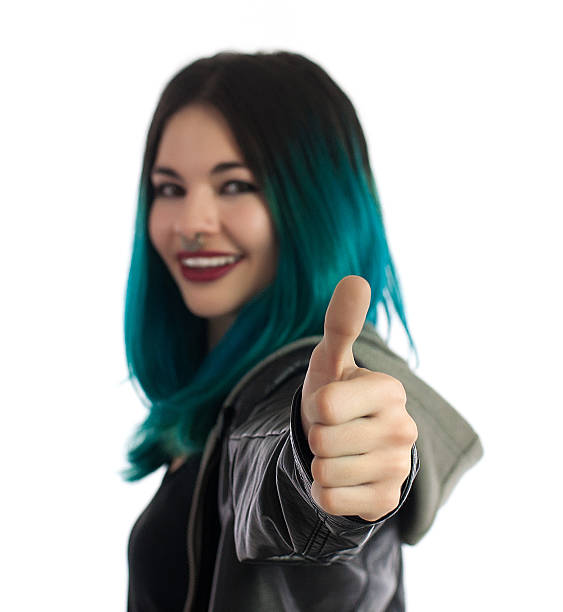istock Smiling girl showing the thumb up sign 515193692