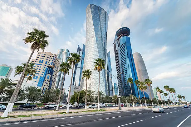 Famous Corniche, the waterfront street along Doha Bay, with its futuristic skyscrapers. 